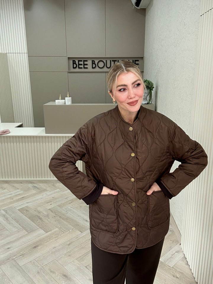KAPİTONE YAKASIZ MONT