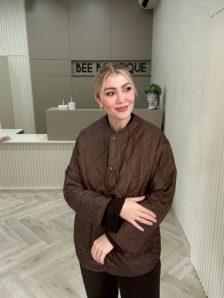 KAPİTONE YAKASIZ MONT